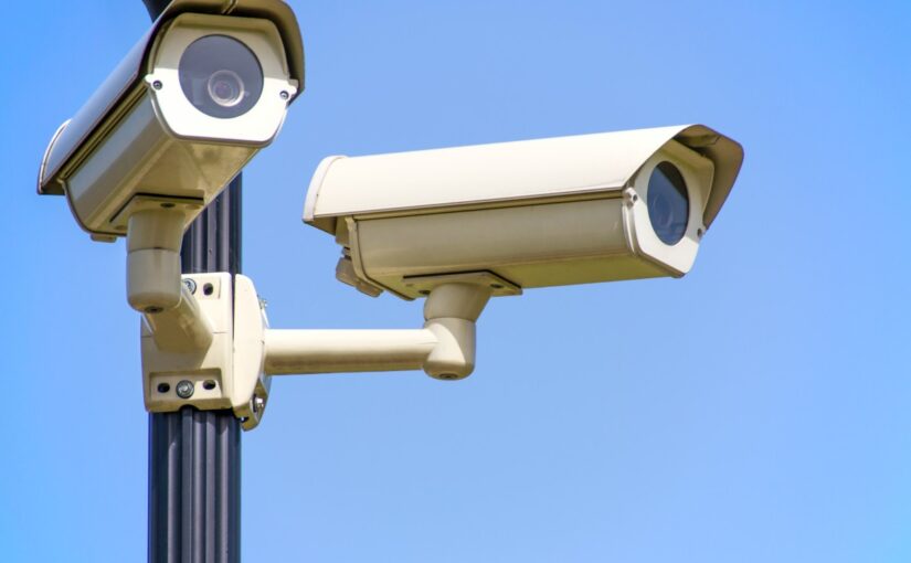 Photo by PhotoMIX Company: https://www.pexels.com/photo/white-2-cctv-camera-mounted-on-black-post-under-clear-blue-sky-96612/